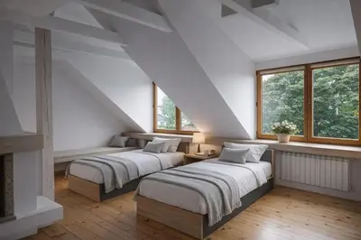 Łóżko lub łóżka w pokoju w obiekcie Two-level Sielecka Apartment