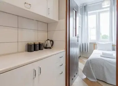 Łóżko lub łóżka w pokoju w obiekcie Close-Golden Apartments Warsaw - Two Bedroom Apartment in the Center -Comfortable and Cozy - Marszałkowska
