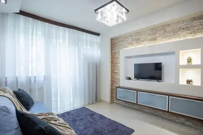 Telewizja i/lub zestaw kina domowego w obiekcie Close-Chic Apartments - Modern and Cozy - Central Location - Grzybowska 5