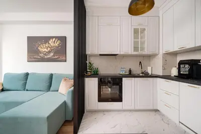 Kuchnia lub aneks kuchenny w obiekcie Praga Komorska Delightful Apartment by BookingHost