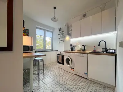 Kuchnia lub aneks kuchenny w obiekcie Paryska Apartament