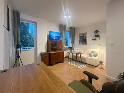 Telewizja i/lub zestaw kina domowego w obiekcie Paryska Apartament