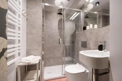 Łazienka w obiekcie Apartament w kamienicy na Żurawiej