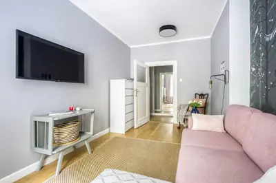 Telewizja i/lub zestaw kina domowego w obiekcie Apartament w kamienicy na Żurawiej