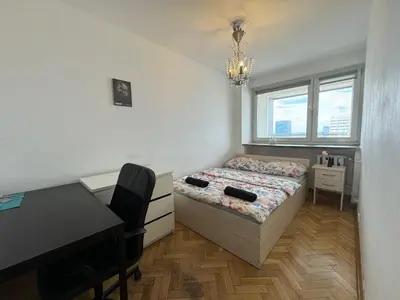 Łóżko lub łóżka w pokoju w obiekcie Fantastic-Inn Warszawa - CH35