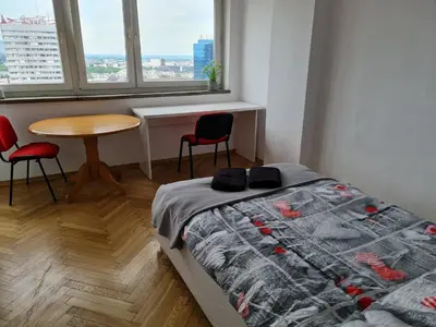 Łóżko lub łóżka w pokoju w obiekcie Fantastic-Inn Warszawa - CH35