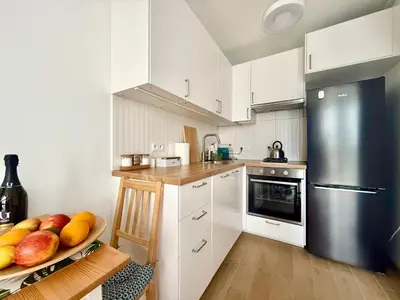 Kuchnia lub aneks kuchenny w obiekcie Cozy Stay Rondo ONZ Apartment
