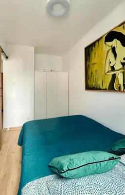 Łóżko lub łóżka w pokoju w obiekcie Cozy Stay Rondo ONZ Apartment
