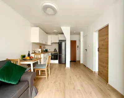 Kuchnia lub aneks kuchenny w obiekcie Cozy Stay Rondo ONZ Apartment