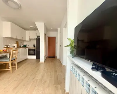 Kuchnia lub aneks kuchenny w obiekcie Cozy Stay Rondo ONZ Apartment