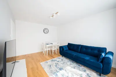 Część wypoczynkowa w obiekcie Stawy Brustmana Homly Apartment by BookingHost