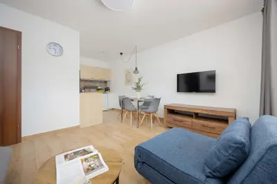 Kuchnia lub aneks kuchenny w obiekcie Atmospheric Apartment for 5 Peoples in Warsaw by Noclegi Renters
