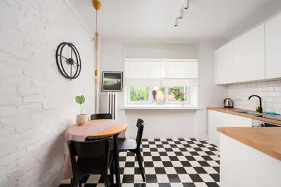 Kuchnia lub aneks kuchenny w obiekcie Nowolipki Bright Studio by BookingHost
