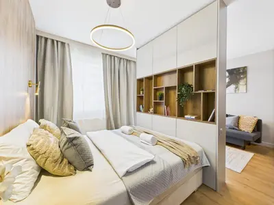 Łóżko lub łóżka w pokoju w obiekcie Podskarbińska 32 SuperApart - Stylowe wnętrza