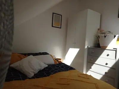 Łóżko lub łóżka w pokoju w obiekcie Racławicka 33 ROOMS SuperApart