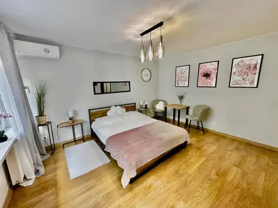 Łóżko lub łóżka w pokoju w obiekcie Metro Mlociny Apartament