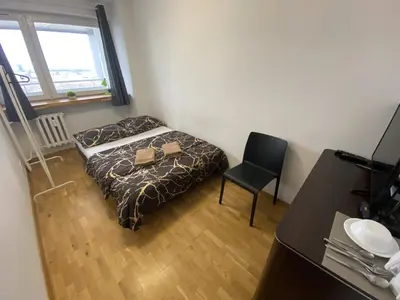 Łóżko lub łóżka w pokoju w obiekcie Fantastic-Inn Warszawa - Świętokrzyska