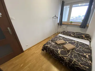 Łóżko lub łóżka w pokoju w obiekcie Fantastic-Inn Warszawa - Świętokrzyska