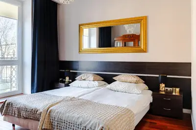 Łóżko lub łóżka w pokoju w obiekcie Warecka street Super central Apt Free parking