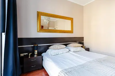 Łóżko lub łóżka w pokoju w obiekcie Warecka street Super central Apt Free parking