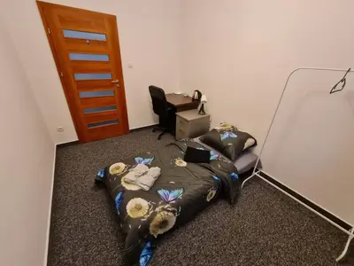 Łóżko lub łóżka w pokoju w obiekcie Fantastic-Inn Warszawa - Jasna