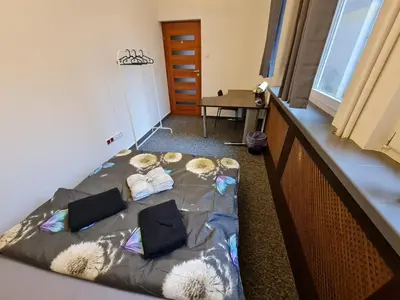 Łóżko lub łóżka w pokoju w obiekcie Fantastic-Inn Warszawa - Jasna
