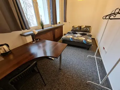 Łóżko lub łóżka w pokoju w obiekcie Fantastic-Inn Warszawa - Jasna