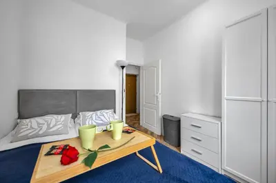 Łóżko lub łóżka w pokoju w obiekcie Bokserska Apt - Chopin Airport Nerby - by Rentujemy