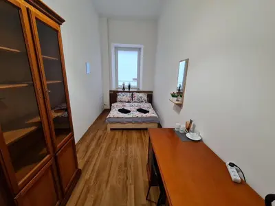 Łóżko lub łóżka w pokoju w obiekcie Fantastic-Inn Warszawa - Czackiego
