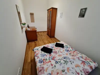 Łóżko lub łóżka w pokoju w obiekcie Fantastic-Inn Warszawa - Czackiego