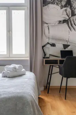 Łóżko lub łóżka w pokoju w obiekcie oompH Warsaw Central 3BR & 2BATHS Grand Residence