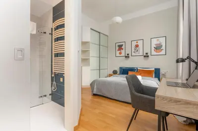 Łóżko lub łóżka w pokoju w obiekcie oompH Warsaw Central 3BR & 2BATHS Grand Residence