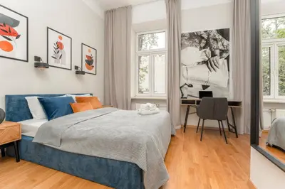 Łóżko lub łóżka w pokoju w obiekcie oompH Warsaw Central 3BR & 2BATHS Grand Residence