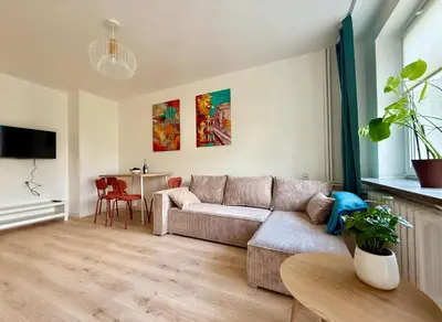 Telewizja i/lub zestaw kina domowego w obiekcie Cozy Stay Washington Avenue Apartment