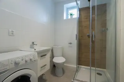 Łazienka w obiekcie Leszno 34-36 Rooms SuperApart