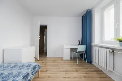 Łóżko lub łóżka w pokoju w obiekcie Leszno 34-36 Rooms SuperApart