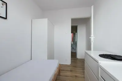 Łóżko lub łóżka w pokoju w obiekcie Leszno 34-36 Rooms SuperApart