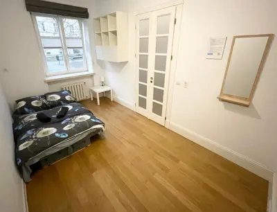 Łóżko lub łóżka w pokoju w obiekcie Fantastic-Inn Warszawa - Kozia