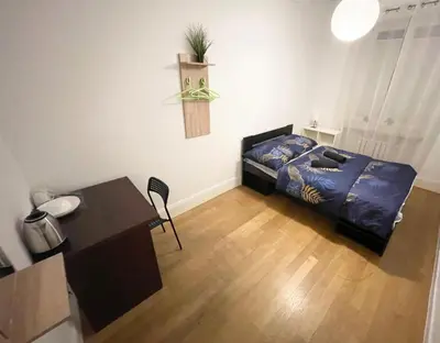 Łóżko lub łóżka w pokoju w obiekcie Fantastic-Inn Warszawa - Kozia