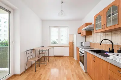 Kuchnia lub aneks kuchenny w obiekcie Metro Stokłosy Homely Apartment by BookingHost