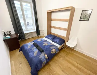 Łóżko lub łóżka w pokoju w obiekcie Fantastic-Inn Warszawa - KP22
