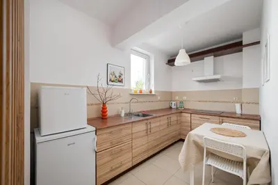 Kuchnia lub aneks kuchenny w obiekcie Liwiecka Bright Studio by BookingHost