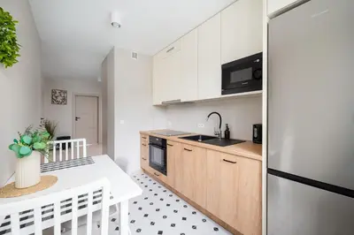Kuchnia lub aneks kuchenny w obiekcie Wrzeciono Comfortline Apartment by BookingHost
