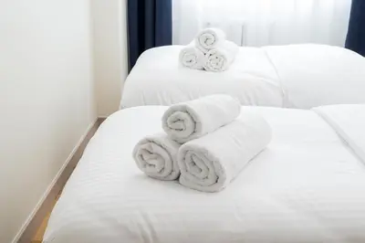 Łóżko lub łóżka w pokoju w obiekcie Wrzeciono Comfortline Apartment by BookingHost