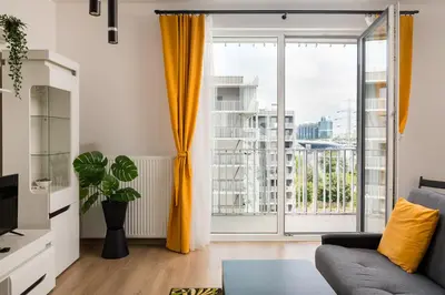 Część wypoczynkowa w obiekcie Wola Gumińska Comfort Apartment by BookingHost