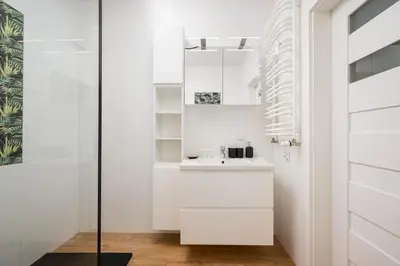 Łazienka w obiekcie Wola Gumińska Comfort Apartment by BookingHost