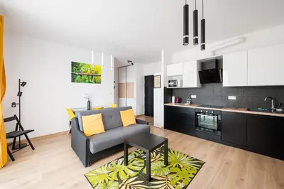 Kuchnia lub aneks kuchenny w obiekcie Wola Gumińska Comfort Apartment by BookingHost
