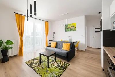 Część wypoczynkowa w obiekcie Wola Gumińska Comfort Apartment by BookingHost