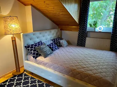 Łóżko lub łóżka w pokoju w obiekcie Damentka's Nest