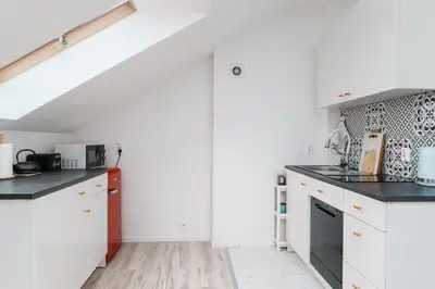 Kuchnia lub aneks kuchenny w obiekcie Cozy Attic